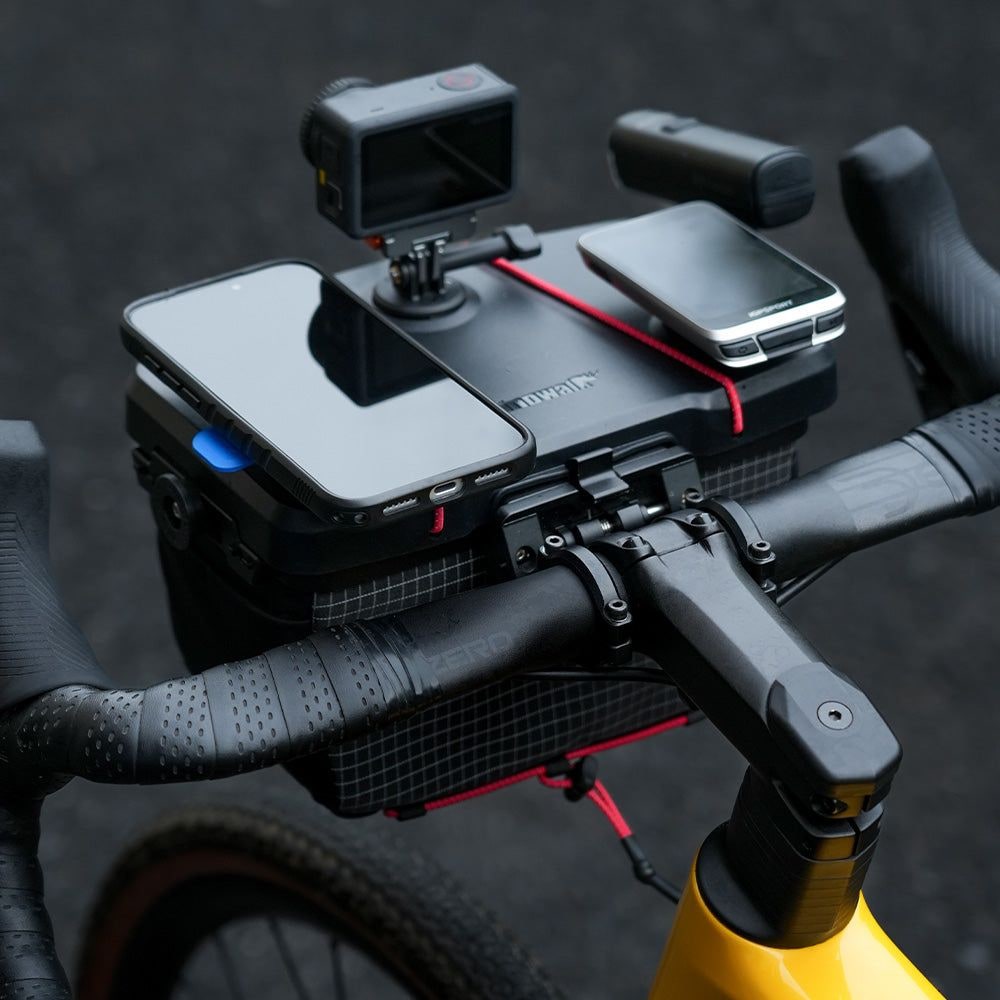 Top view of a Rhinowalk Space Station bag on a road bike with a phone, action camera and light mounted on the lid