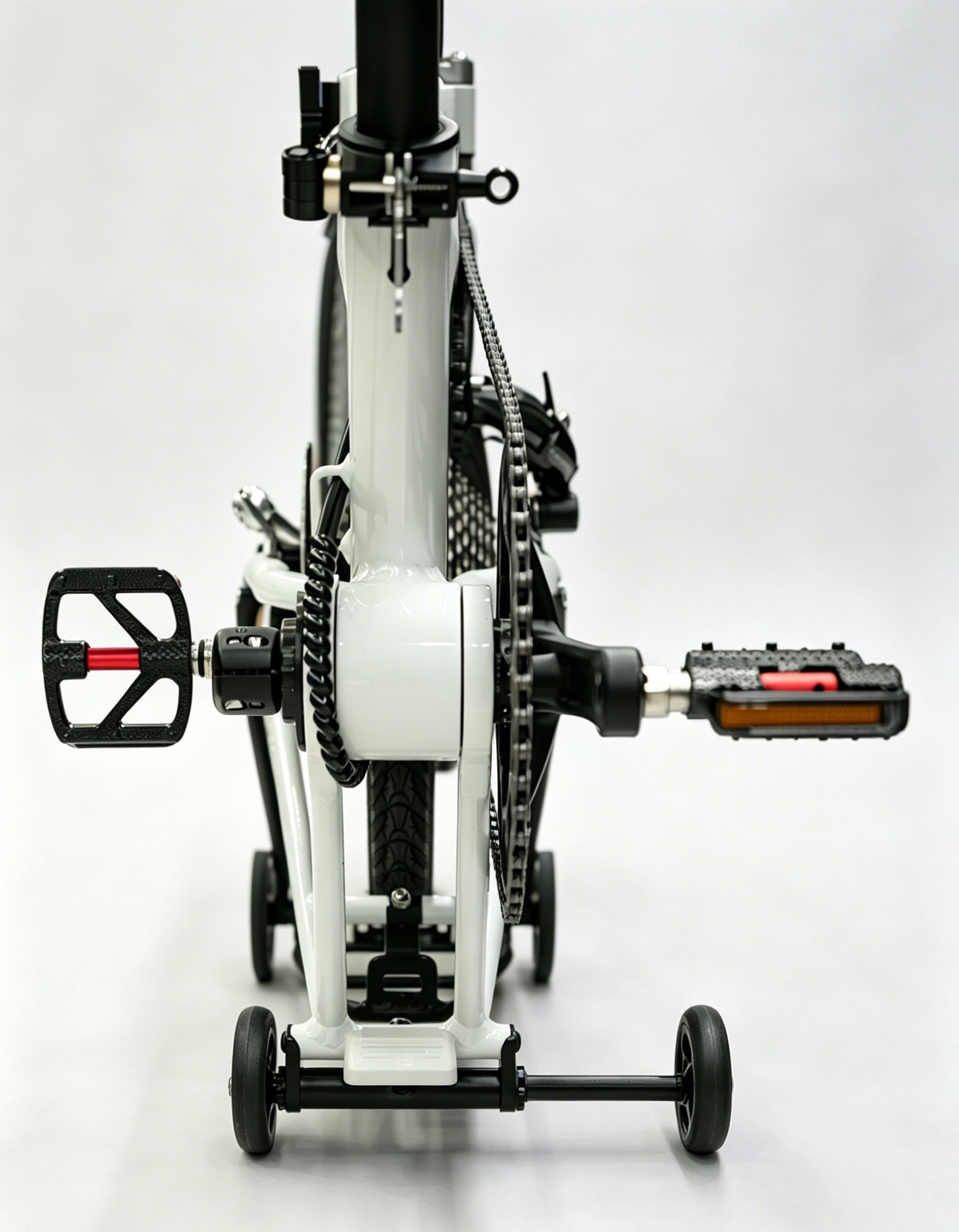 Rear view of a folded Java Neo with easy wheels at both ends of the bar